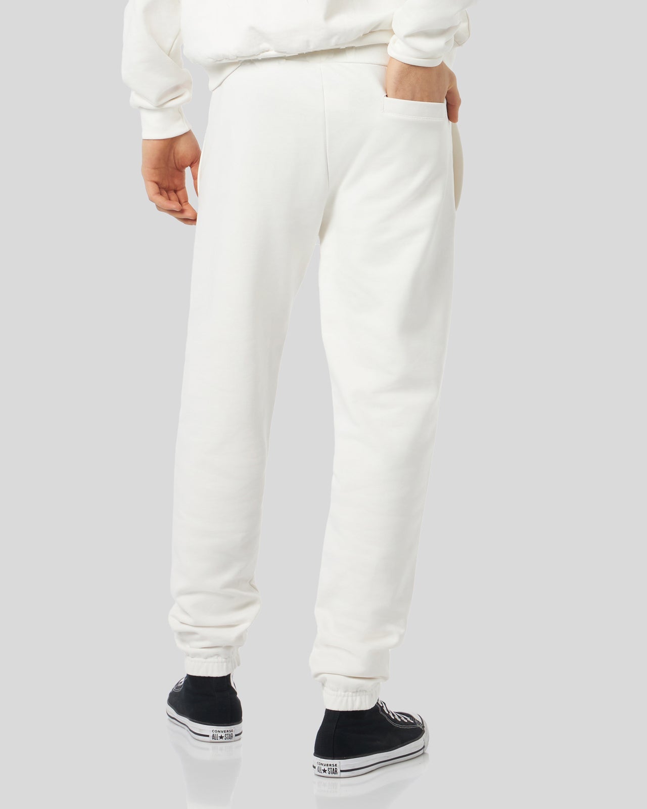 WHITE PANTS WITH EMBROIDERED LOGO