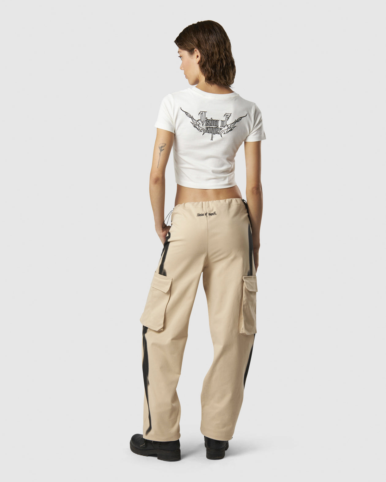 LIGHT SAND CARGO PANTS WITH EMBROIDERED TRIBAL LOGO ON BACK AND PRINTED TRIBAL FLAMES ON SIDES
