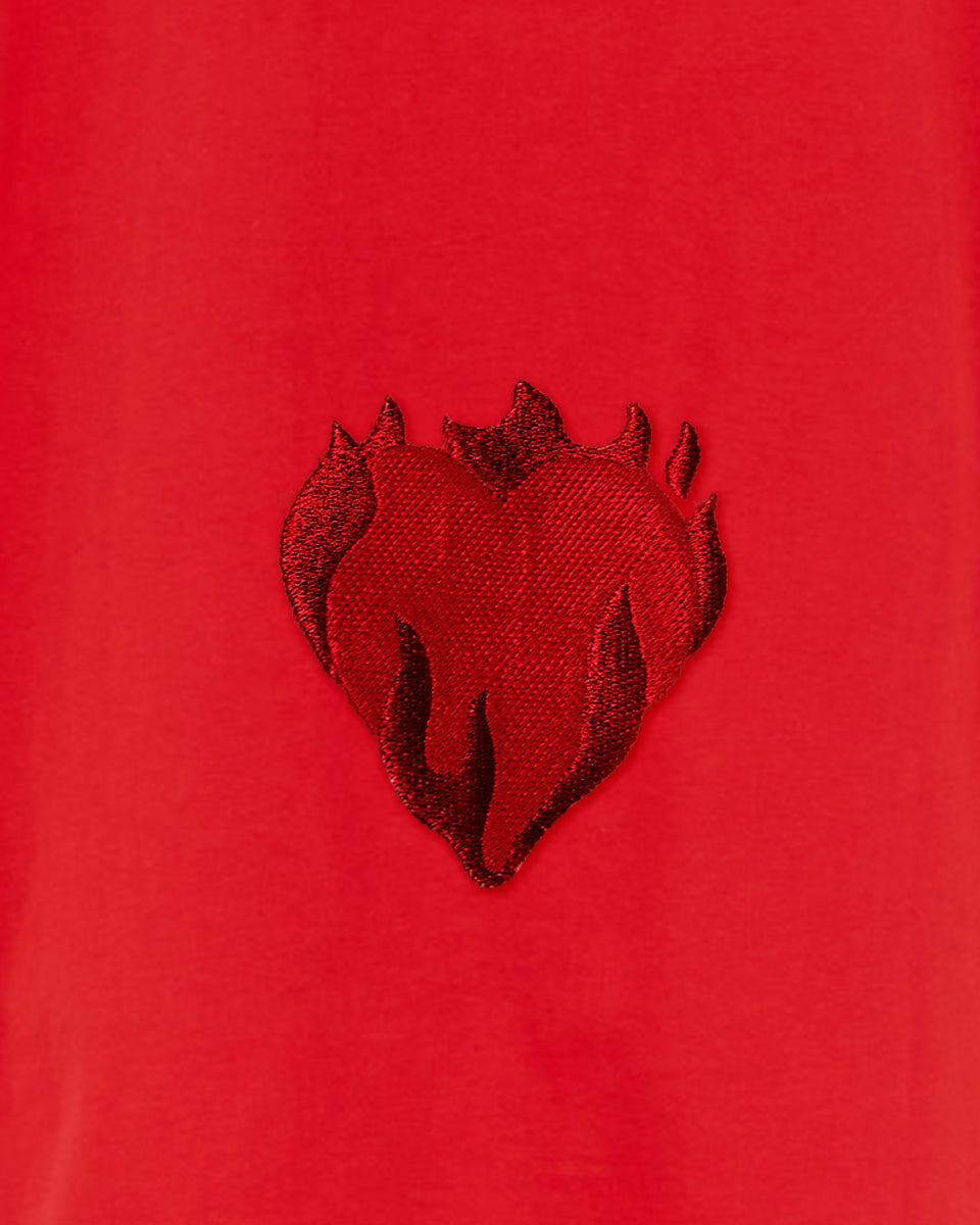 RED PANTS WITH EMBROIDERED FLAMING HEART