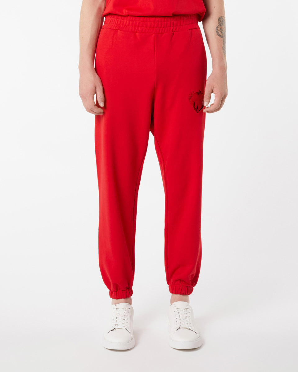 RED PANTS WITH EMBROIDERED FLAMING HEART