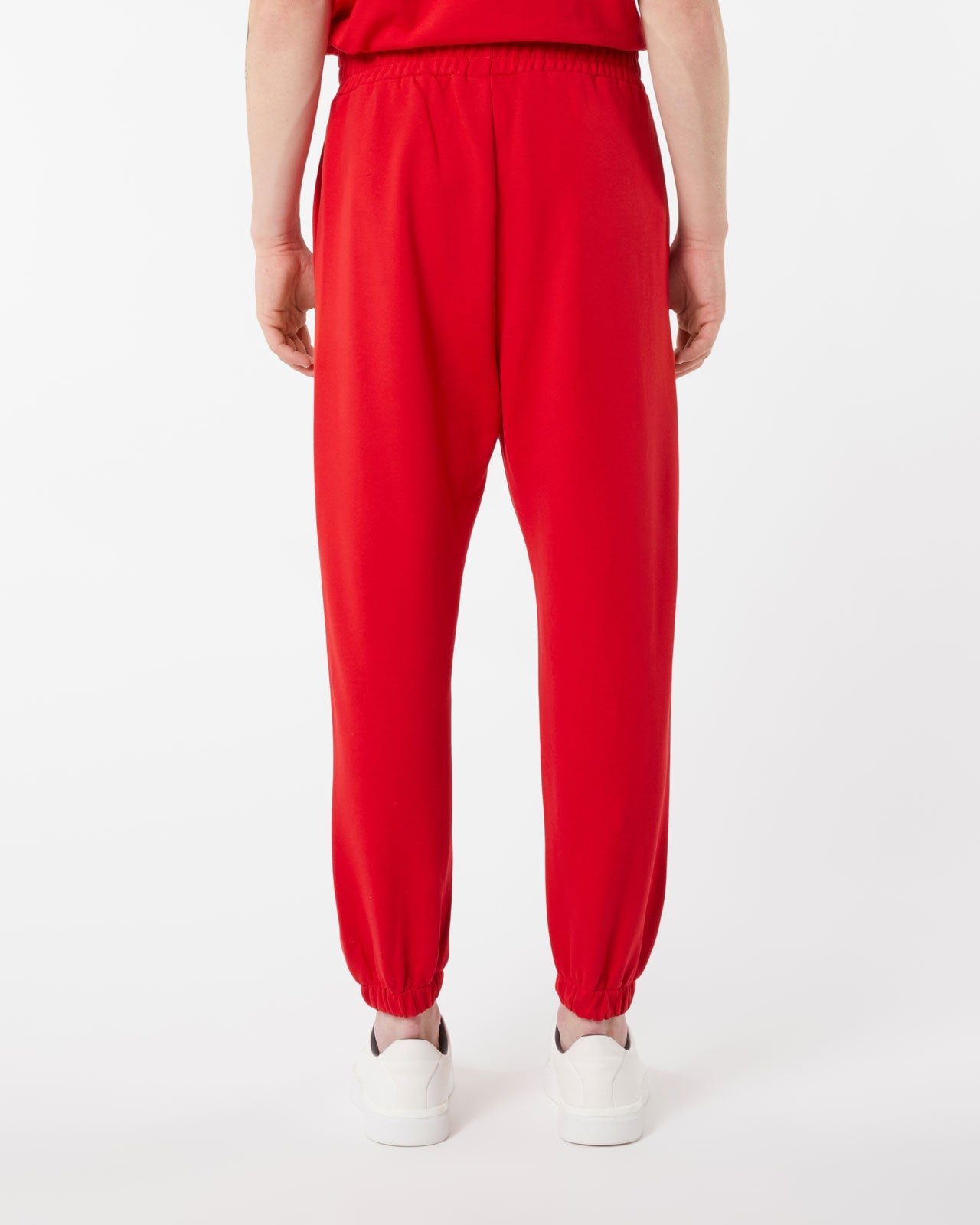 RED PANTS WITH EMBROIDERED FLAMING HEART