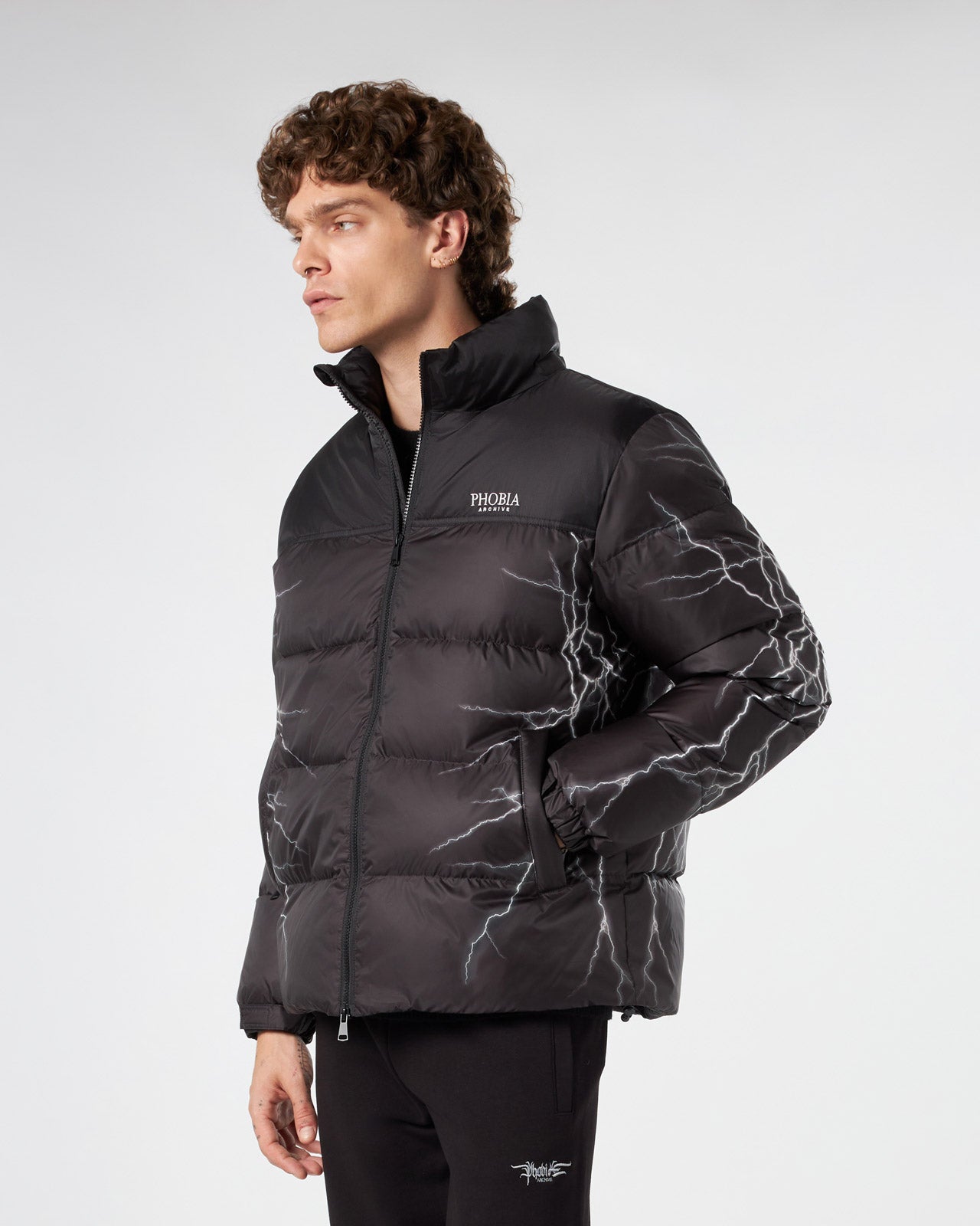 BLACK PUFFER JACKET WITH GREY LIGHTNING PRINT