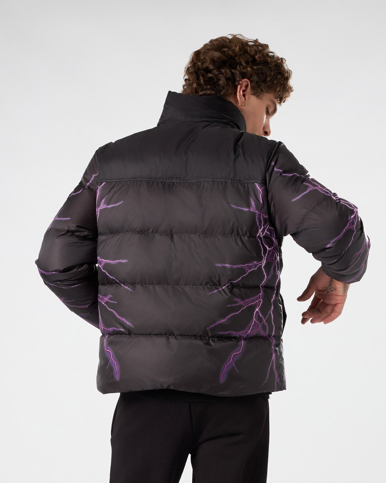 BLACK PUFFER JACKET WITH PURPLE LIGHTNING PRINT