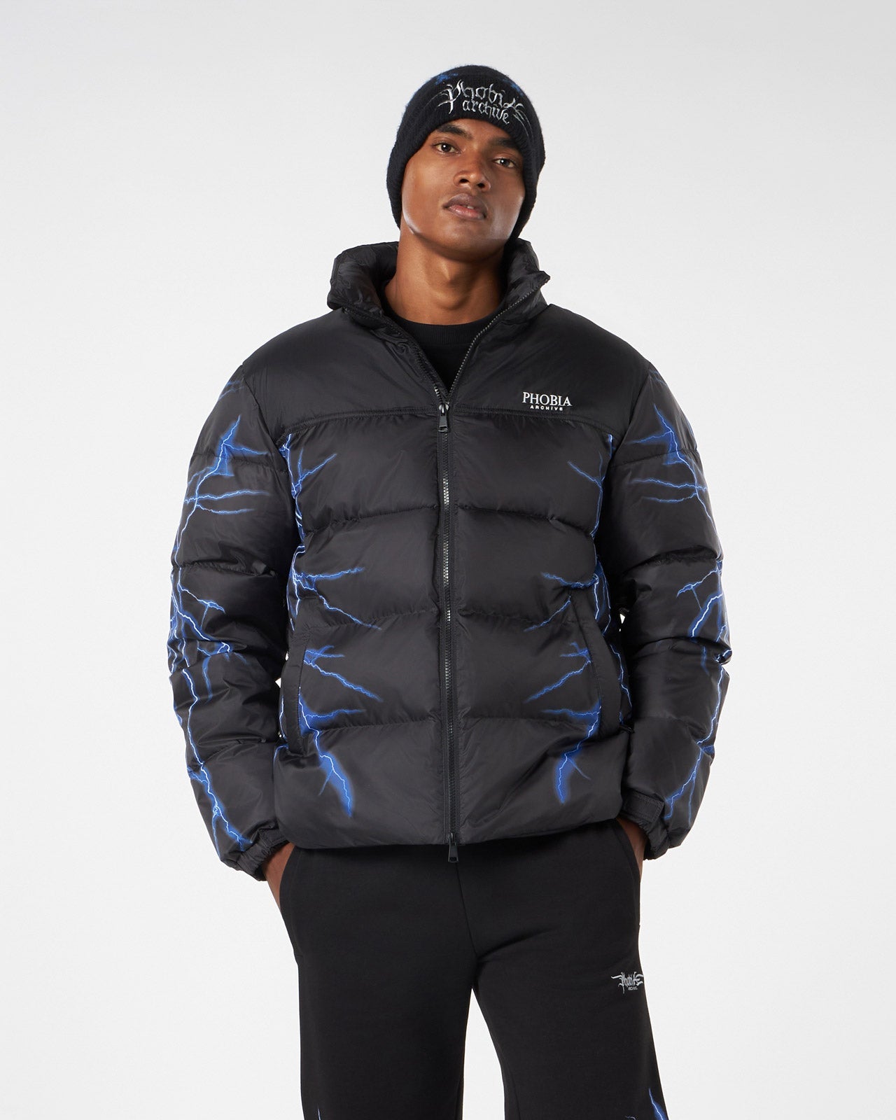 BLACK PUFFER JACKET WITH BLUE LIGHTNING PRINT