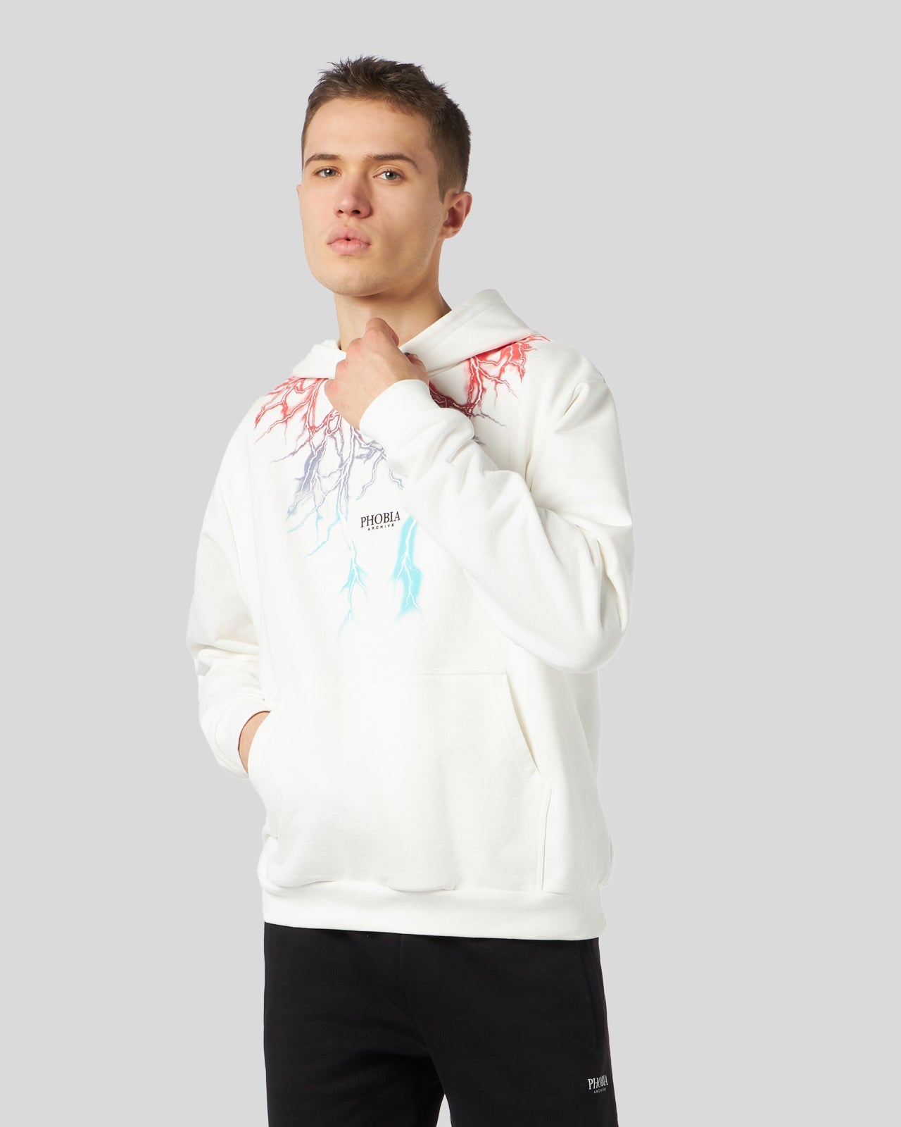 WHITE HOODIE WITH BICOLOR RED-BLUE LIGHTNING PRINT