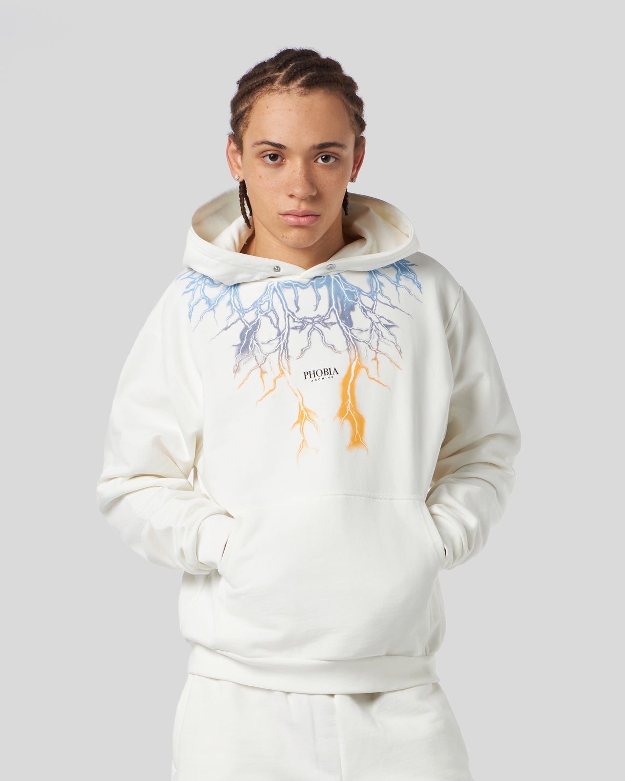 WHITE HOODIE WITH BICOLOR BLUE-YELLOW LIGHTNING PRINT