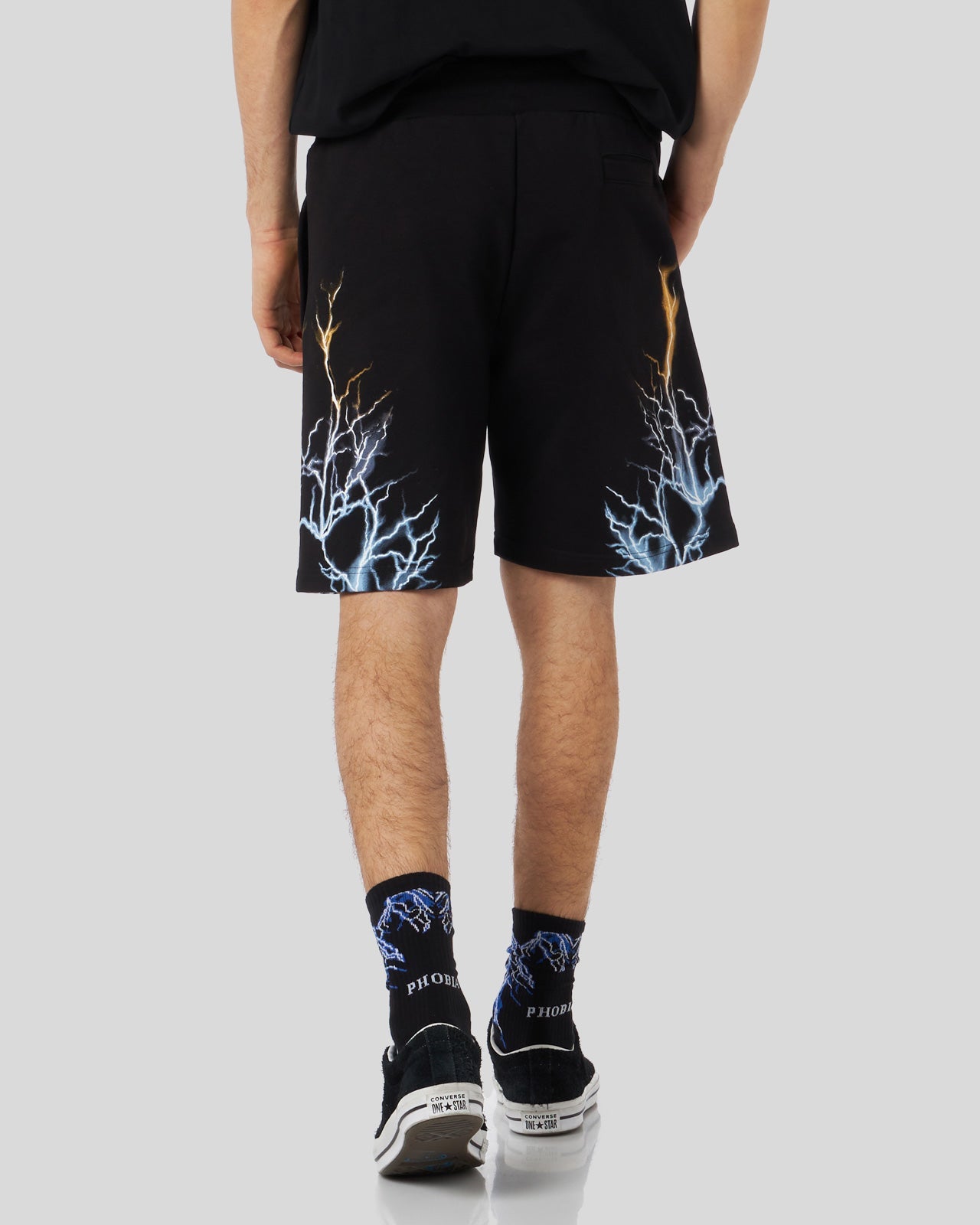 BLACK SHORTS WITH BICOLOR BLUE-YELLOW LIGHTNING PRINT