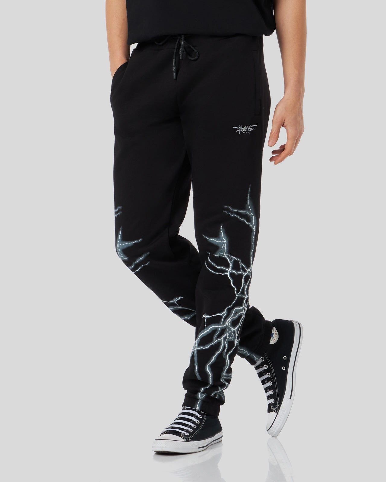 BLACK PANTS WITH LATERAL WHITE LIGHTNING PRINT