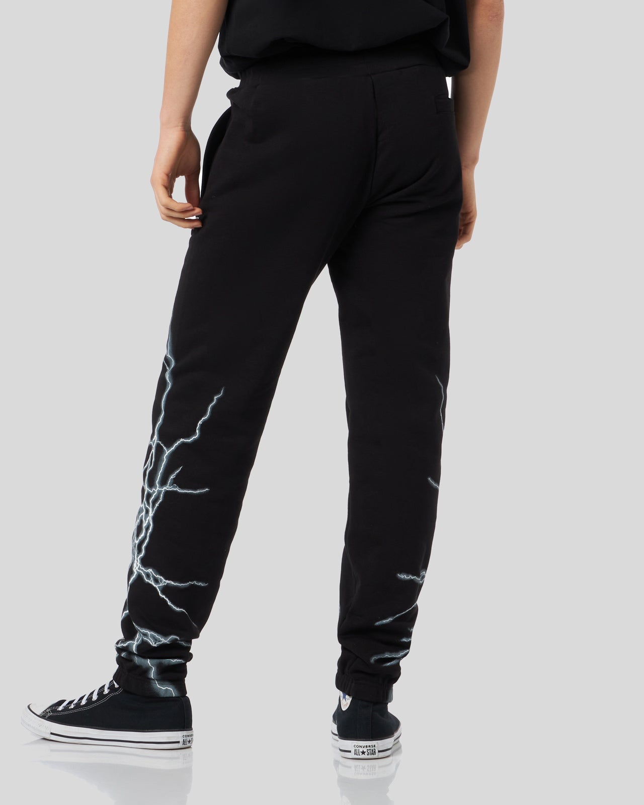 BLACK PANTS WITH LATERAL WHITE LIGHTNING PRINT