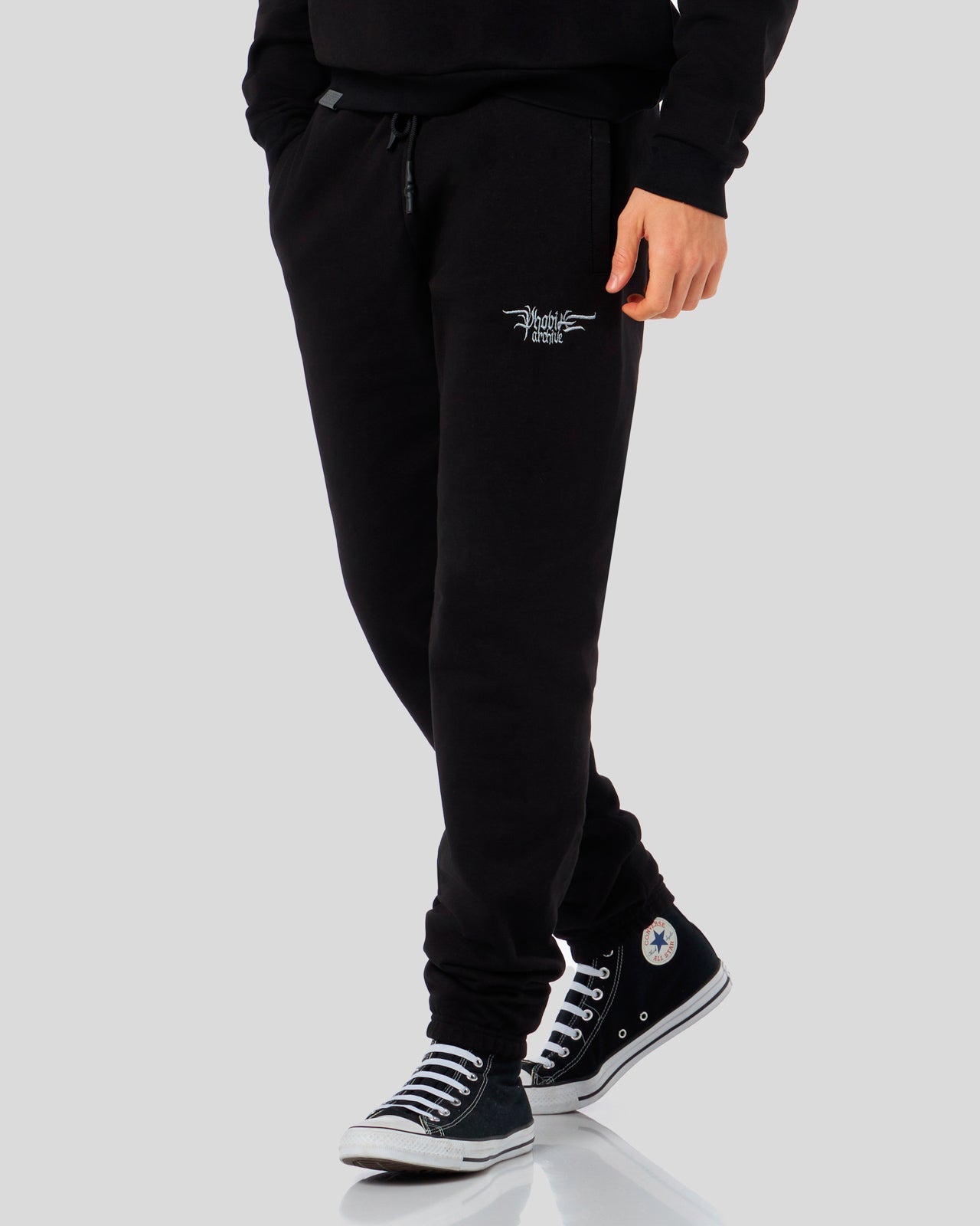 BLACK PANTS WITH EMBROIDERED GOTHIC LOGO
