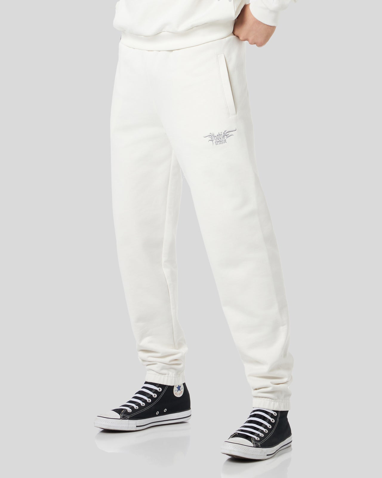 WHITE PANTS WITH EMBROIDERED LOGO