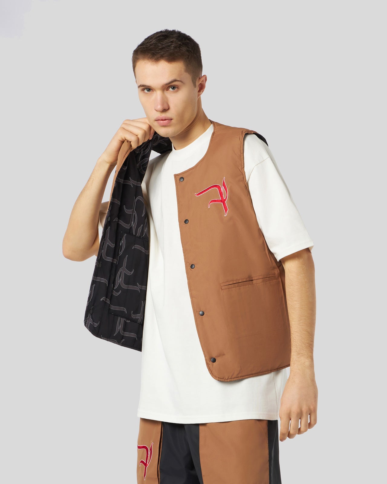 DOUBLE FACE GILET WITH ALL OVER GOTIC P AND BIG LABEL