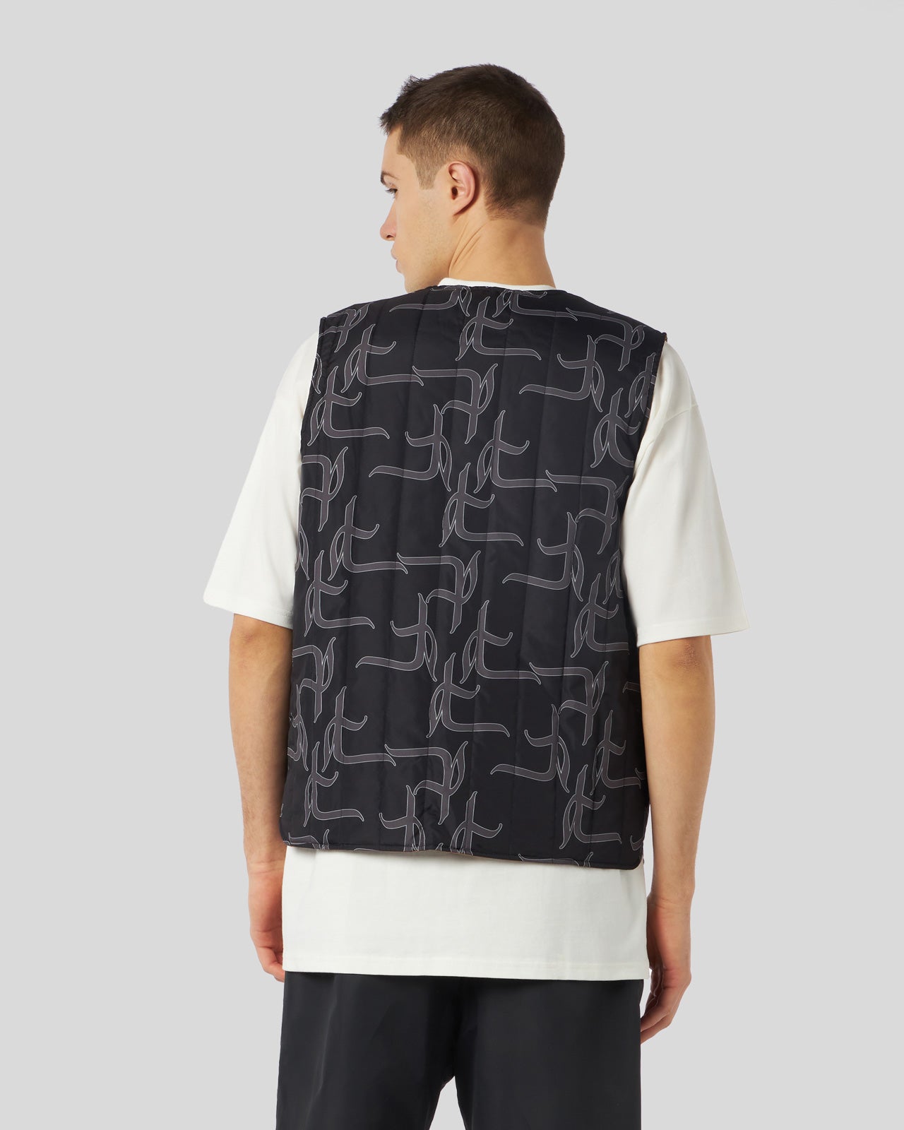 DOUBLE FACE GILET WITH ALL OVER GOTIC P AND BIG LABEL