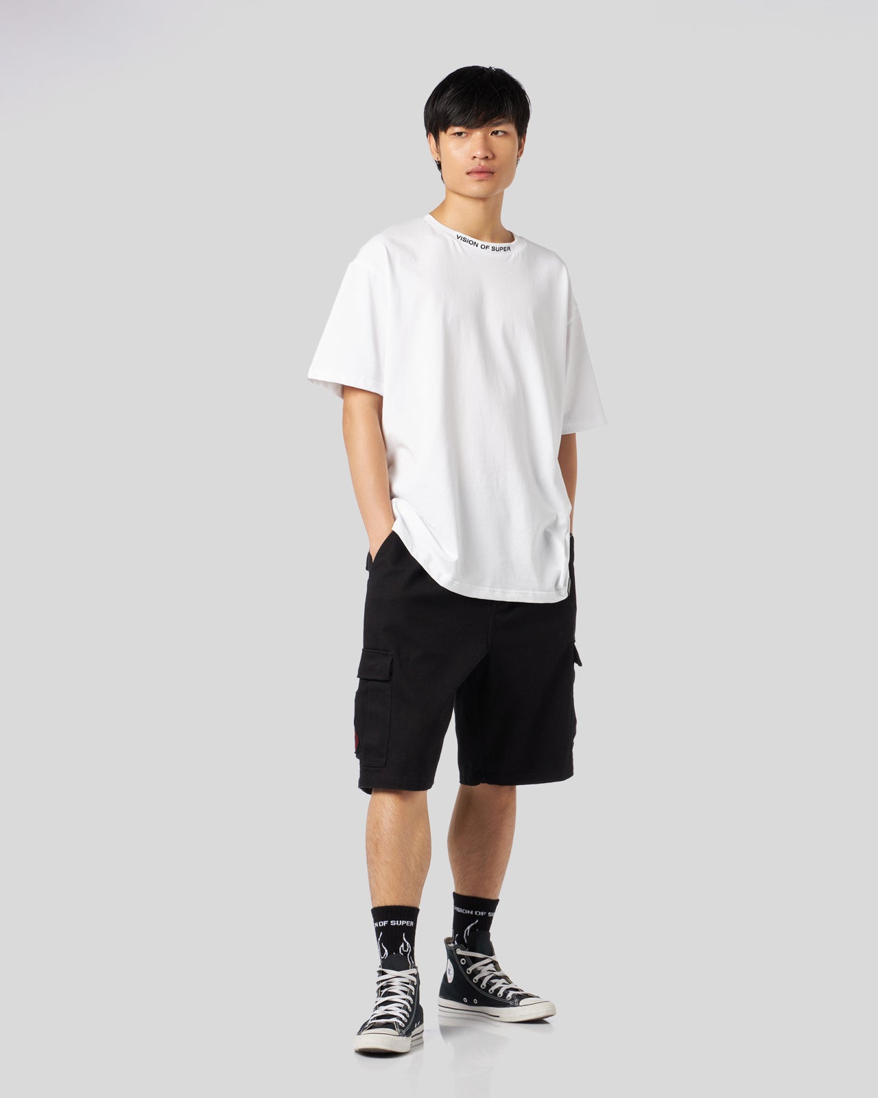 BLACK CARGO SHORTS WITH FLAMES PATCH AND PRINTED LOGO