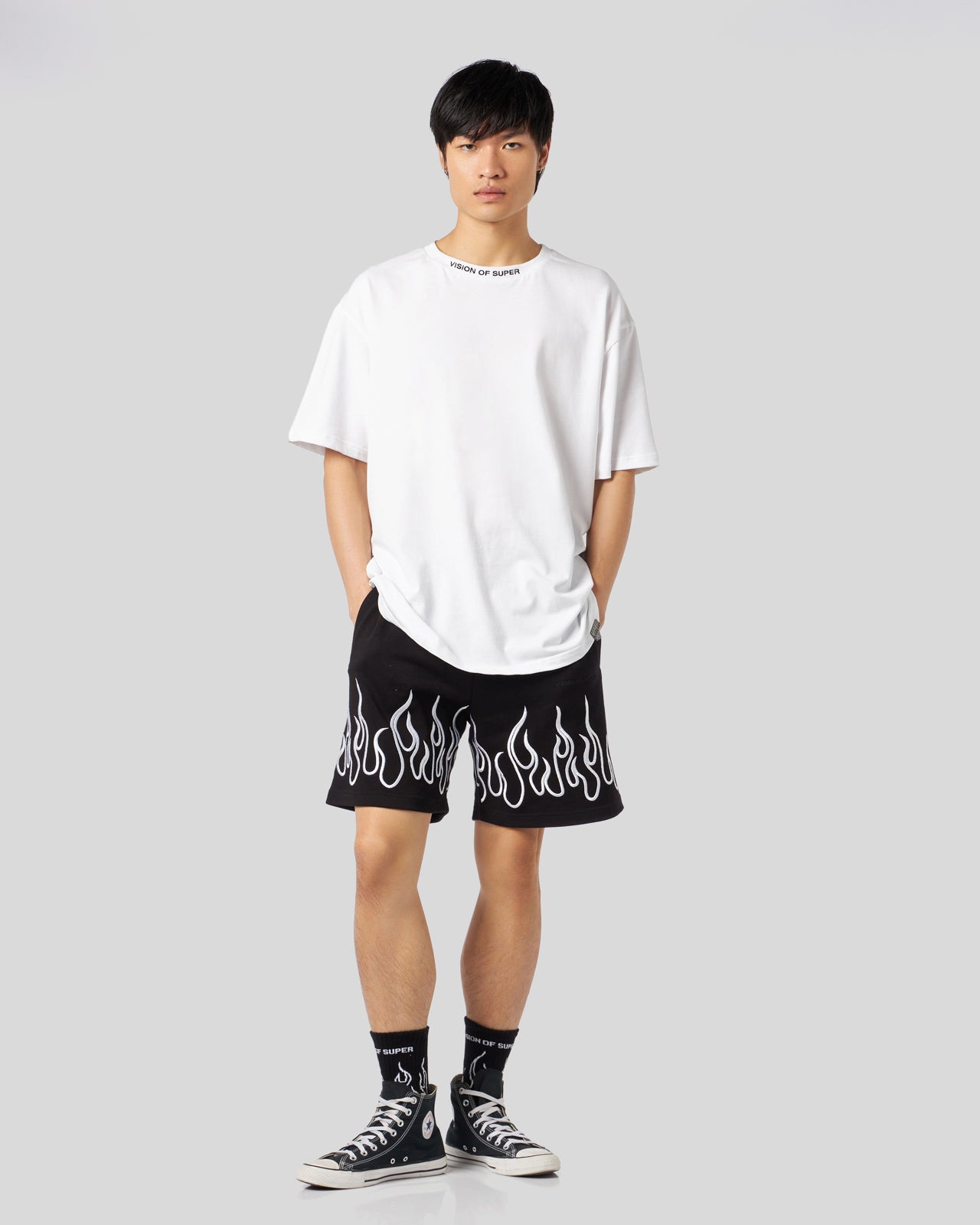 BLACK SHORTS WITH EMBROIDERED WHITE FLAMES