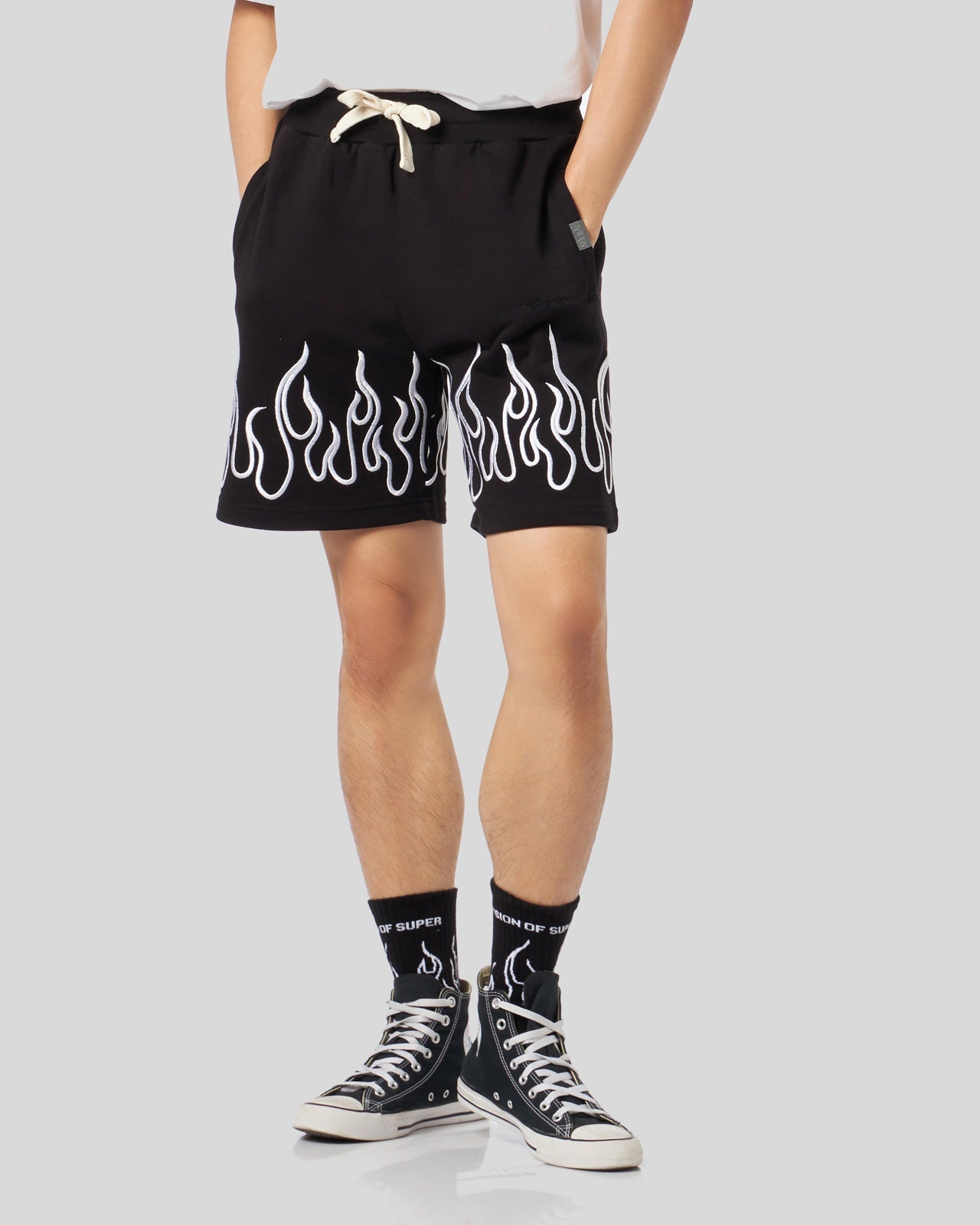 BLACK SHORTS WITH EMBROIDERED WHITE FLAMES