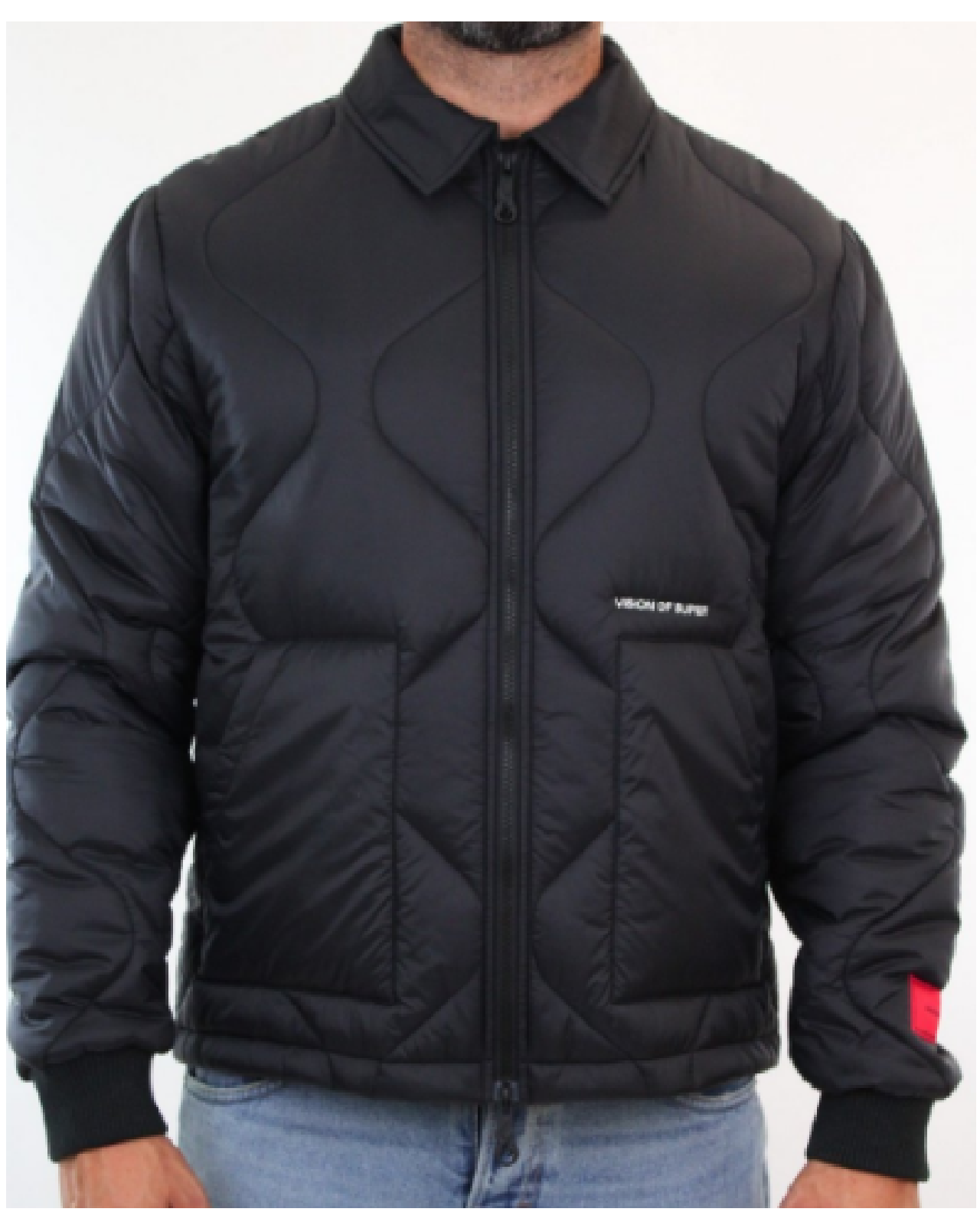 BLACK QUILTED JACKET WITH SKULL PATCH AND RED LABEL