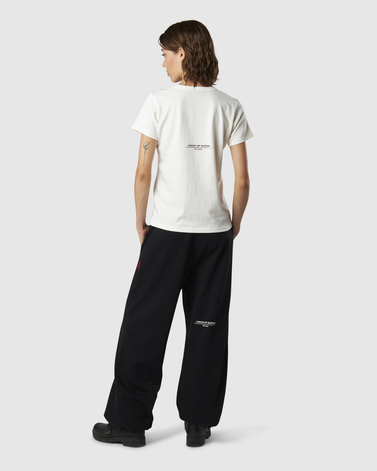 WHITE T-SHIRT WITH EMBROIDERED FLAME LOGO ON FRONT AND PRINTED LOGO ON BACK