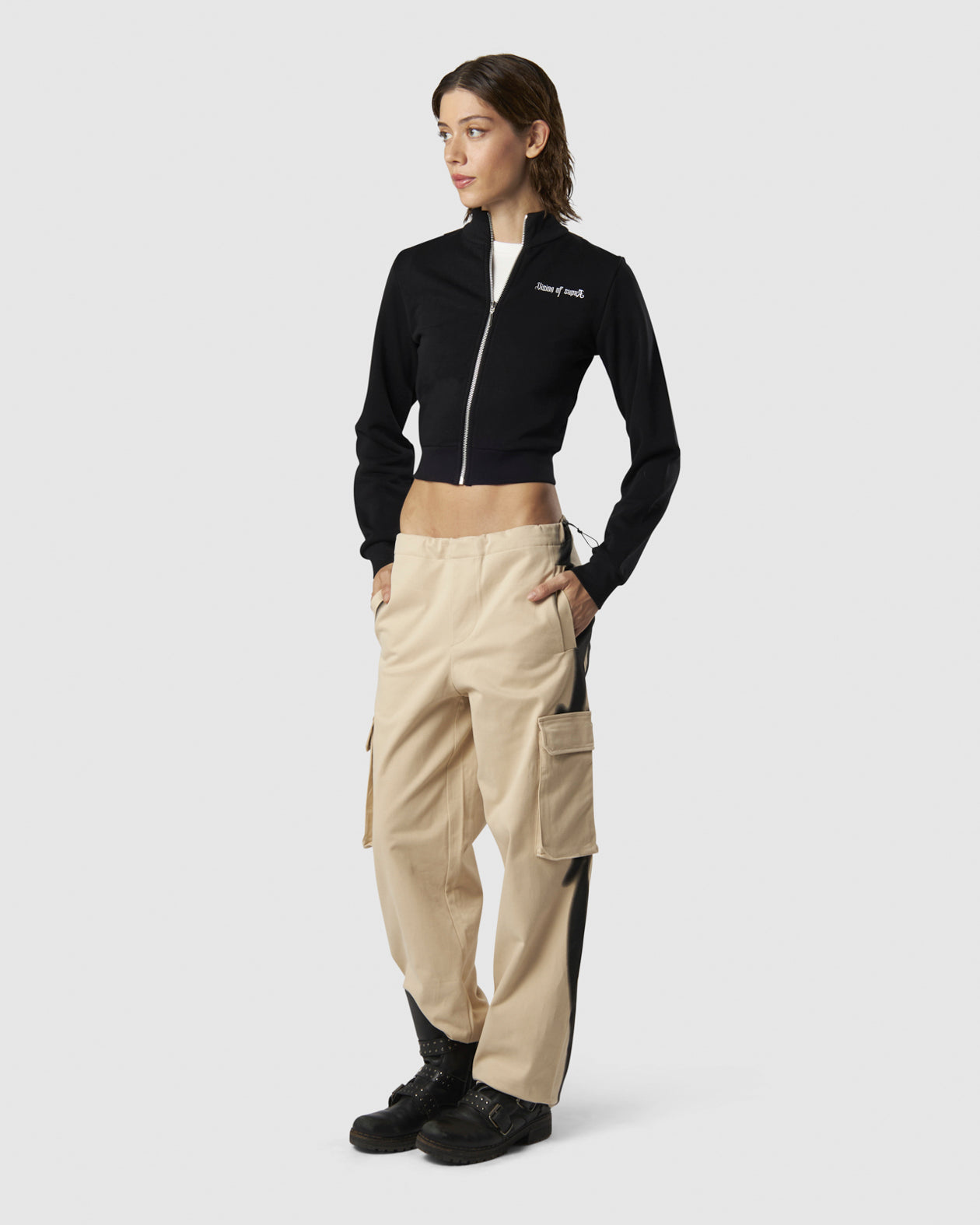 BLACK LONGSLEEVE ZIP WITH EMBROIDERED LOGO ON FRONT AND EMBROIDERED TRIBAL GRAPHIC ON BACK